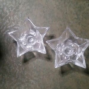 Pair of star shaped candle holders